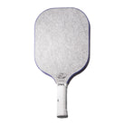 A white and blue OWL CX pickleball paddle that features a silver OWL logo on the noise-reducing surface