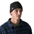 Front view of a black Patagonia Better Sweater Beanie featuring 100% recycled polyester sweater-knit fleece fabric, a doubled cuff design, and a low-profile construction.