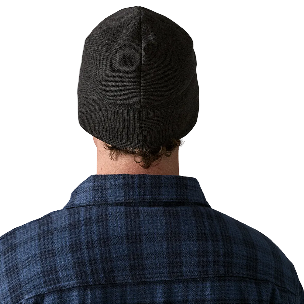 Rear view of a black Patagonia Better Sweater Beanie featuring 100% recycled polyester sweater-knit fleece fabric, a doubled cuff design, and a low-profile construction.