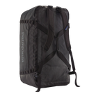 Rear view of the black on black Patagonia Black Hole Duffel 100L featuring weather-resistant TPU-laminated ripstop fabric, removable ergonomic backpack shoulder straps, reinforced end haul handles, a padded base, and heavy-duty exterior daisy chain lash loops.