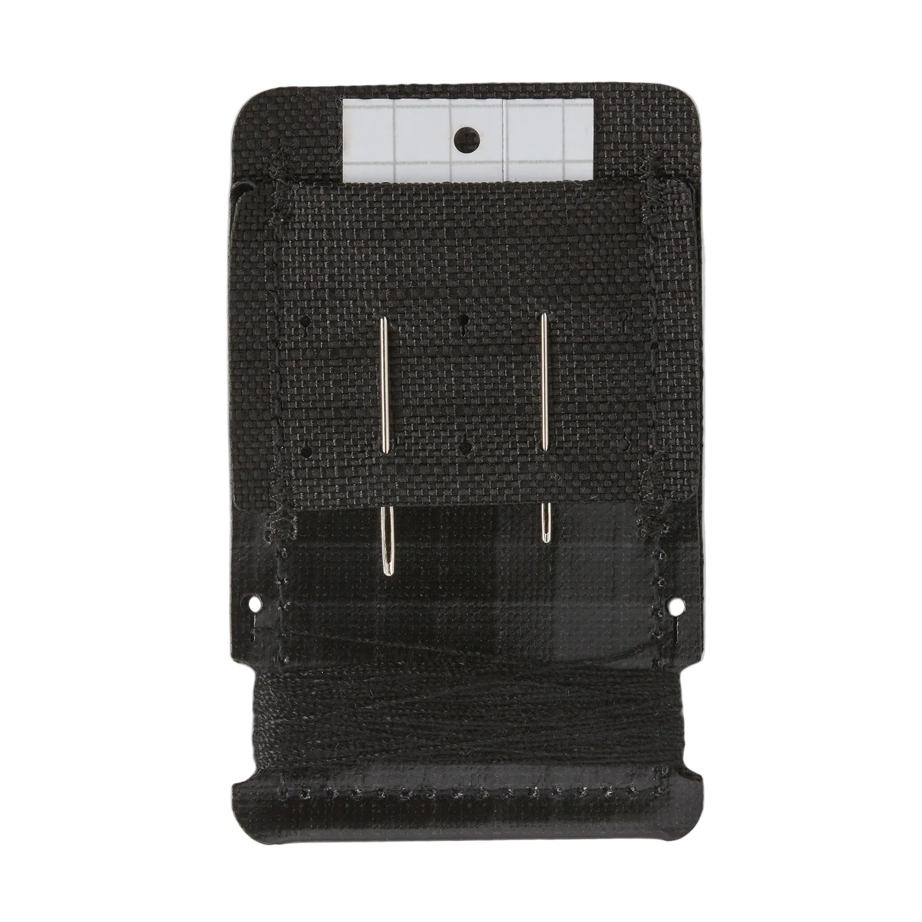 The inside of a Patagonia Field Repair Kit, featuring a weather-resistant 100% recycled nylon ripstop shell, organized interior pockets, heavy-duty needles, high-tenacity thread, and pressure-sensitive repair patches.