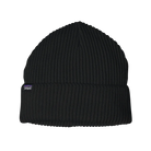 Front view of a black Patagonia Fisherman's Rolled Beanie featuring 100% recycled polyester 1x1 rib-knit construction, an adjustable roll-up cuff, and a woven logo label.