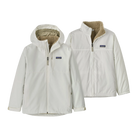 Front view of the birch white Patagonia Junior 4-in-1 Everyday Jacket showing the 2-layer H2No Performance Standard waterproof outer shell connected to a removable, reversible zip-out liner, featuring a three-panel hood with elasticized internal gusset, full-length waterproof center-front zipper with internal storm flap, zippered chest and handwarmer pockets, and adjustable cuff tabs.
