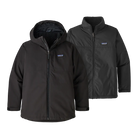 Front view of the black Patagonia Junior 4-in-1 Everyday Jacket showing the 2-layer H2No Performance Standard waterproof outer shell connected to a removable, reversible zip-out liner, featuring a three-panel hood with elasticized internal gusset, full-length waterproof center-front zipper with internal storm flap, zippered chest and handwarmer pockets, and adjustable cuff tabs.