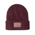 Front view of a berry fig Patagonia Junior Logo Beanie featuring a fine-gauge recycled polyester knit, a fold-over rib-knit cuff, and an embroidered front logo patch.