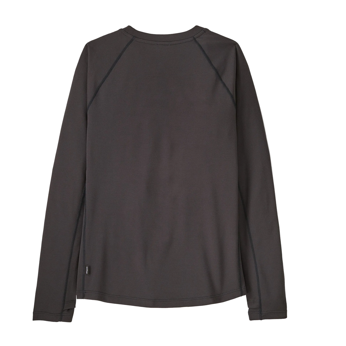 Rear view of the ink black Patagonia Junior Capilene Midweight Crew featuring 100% recycled grid-fleece fabric, raglan sleeves, underarm gussets, internal neck taping, flatlock seam construction, elastic thumb loops, and a drop-tail hem.