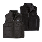Front view of the Patagonia Junior Reversible Ready Freddy Vest showing the smooth woven 100% recycled polyester shell side with 60g Thermogreen insulation, featuring a full-length center-front zipper with chin guard, a contrast zippered nylon chest pocket, welted handwarmer pockets, and a high-pile recycled fleece interior visible at the collar.