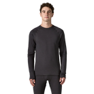 Front view of the black Patagonia Men's Capilene Thermal Weight Crew Baselayer featuring Polartec Power Grid fabric with an open-grid brushed interior, a self-fabric crewneck, offset shoulder seams, full underarm gussets, flatlock seam construction, elastic thumb loops, and a subtle drop-tail hem.