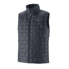 A smolder blue men's Patagonia Nano Puff Vest that is made from recylcled polyester and is designed for harsh winter conditions.