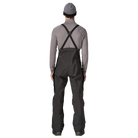Rear view of the Patagonia Men's PowSlayer Bib Pants featuring a 3-layer GORE-TEX Pro shell construction with a 100% recycled nylon face fabric, a low-profile bib with adjustable elastic suspenders, a full-coverage drop-seat configuration, watertight Vislon side ventilation zippers, dual thigh cargo pockets, a central chest pocket, inner ankle scuff guards, internal boot gaiters with gripper elastic, and a built-in RECCO reflector.