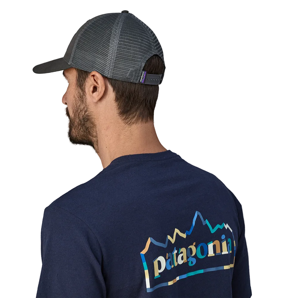 Rear view of a forge grey Patagonia P-6 Logo LoPro Trucker Hat featuring an organic cotton canvas front crown, embroidered original artwork, NetPlus precurved brim, recycled polyester mesh back, and an adjustable rear snap closure.