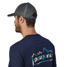 Rear view of a forge grey Patagonia P-6 Logo LoPro Trucker Hat featuring an organic cotton canvas front crown, embroidered original artwork, NetPlus precurved brim, recycled polyester mesh back, and an adjustable rear snap closure.