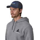 Front view of a new navy Patagonia P-6 Logo LoPro Trucker Hat featuring an organic cotton canvas front crown, embroidered original artwork, NetPlus precurved brim, recycled polyester mesh back, and an adjustable rear snap closure.