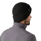 Rear view of a black Patagonia SnowDrifter Beanie featuring a fine-gauge recycled polyester knit, low-profile helmet-compatible crown, and an interior microfleece headband lining.