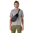 Front view of a black Patagonia Terravia Hip Pack featuring recycled nylon ripstop fabric, dual stretch-mesh water-bottle pockets, zippered main and front stash pockets, an airmesh back panel, and an adjustable webbed waist strap.
