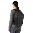 Rear view of a black Patagonia Terravia Pack 22L featuring 100% recycled nylon ripstop fabric, breathable Regulator airmesh shoulder straps, a front quick-stash pocket, dual side stretch water-bottle pockets, and trekking pole attachment loops.