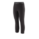 Front view of the black Patagonia Women's Capilene Thermal Weight Boot Length Baselayer Bottoms featuring a 3/4 boot-length hem, Polartec Power Grid fabric with an open-grid brushed interior, a flat elastic waistband, a gusseted crotch, and flatlock seam construction.