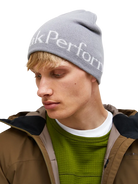 Front view of the Peak Performance Logo Hat featuring a soft double-layer knitted construction, fold-up cuff, stretch fit, and an embroidered front logo.