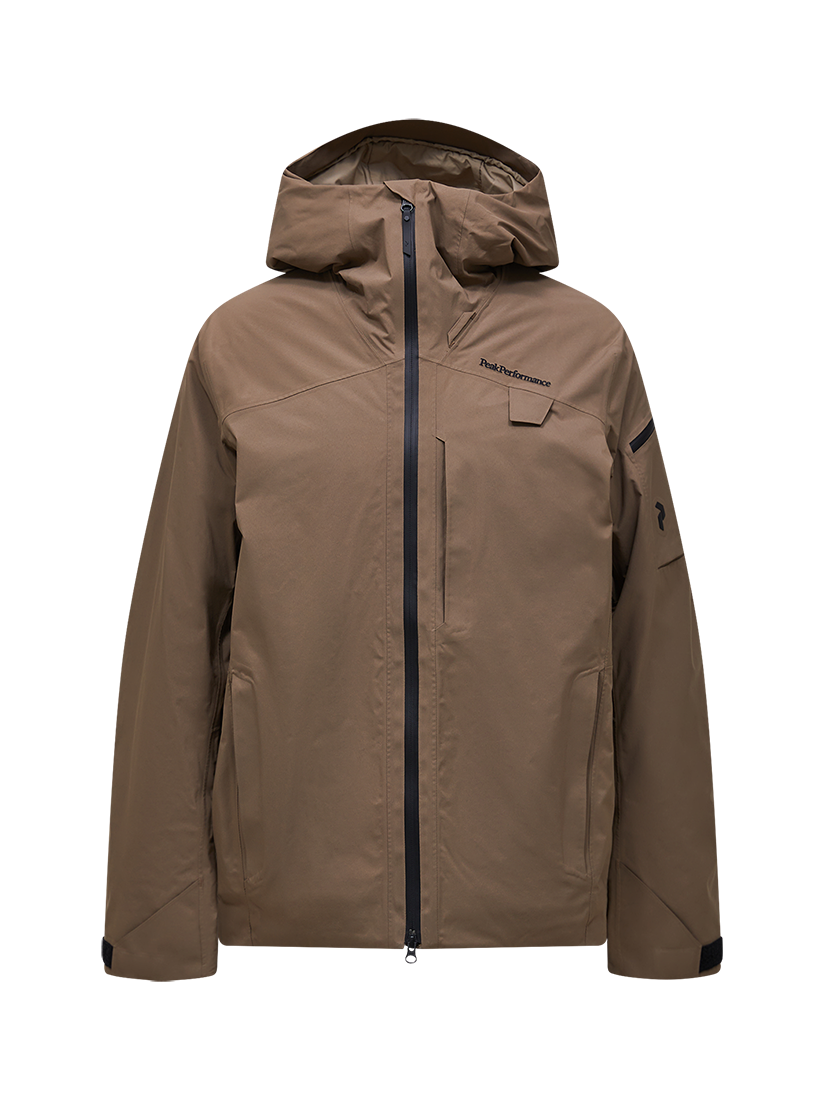 Front view of a tan Peak Performance Men's Alpine GORE-TEX 2L Insulated Shell Jacket featuring a 2-layer GORE-TEX waterproof membrane, YKK AquaGuard storm zippers, a radio pocket, and a helmet-compatible hood.