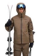 Front view of a tan Peak Performance Men's Alpine GORE-TEX 2L Insulated Shell Jacket featuring a 2-layer GORE-TEX waterproof membrane, YKK AquaGuard storm zippers, a radio pocket, and a helmet-compatible hood.