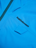 Peak Performance Men's Alpine GORE-TEX 3L Ski Jacket featuring waterproof GORE-TEX 3-layer construction, helmet-compatible hood, ventilation zips, and alpine-ready performance.