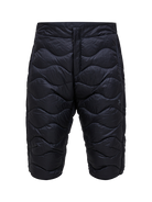 Front view of black Peak Performance Men's Helium Down Shorts featuring ultra-lightweight windproof fabric, signature wave quilting, 700-fill-power down insulation, and full-length side zips.
