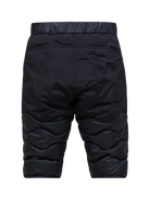 Rear view of black Peak Performance Men's Helium Down Shorts featuring ultra-lightweight windproof fabric, signature wave quilting, 700-fill-power down insulation, and full-length side zips.