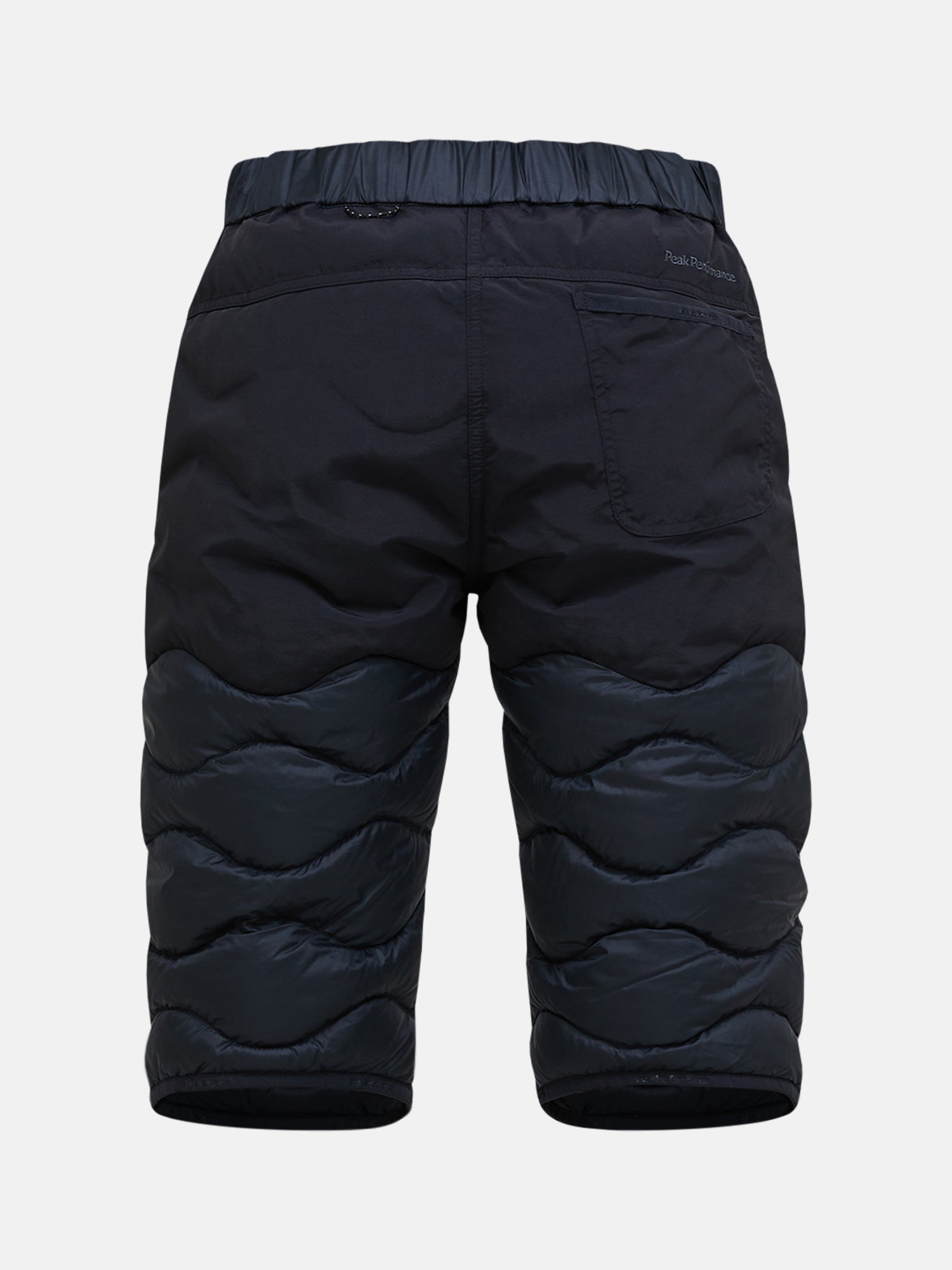 Peak Performance Men's Helium Down Ski Shorts featuring premium down insulation, full-length side zippers, wind-resistant fabric, and an athletic fit for winter performance.