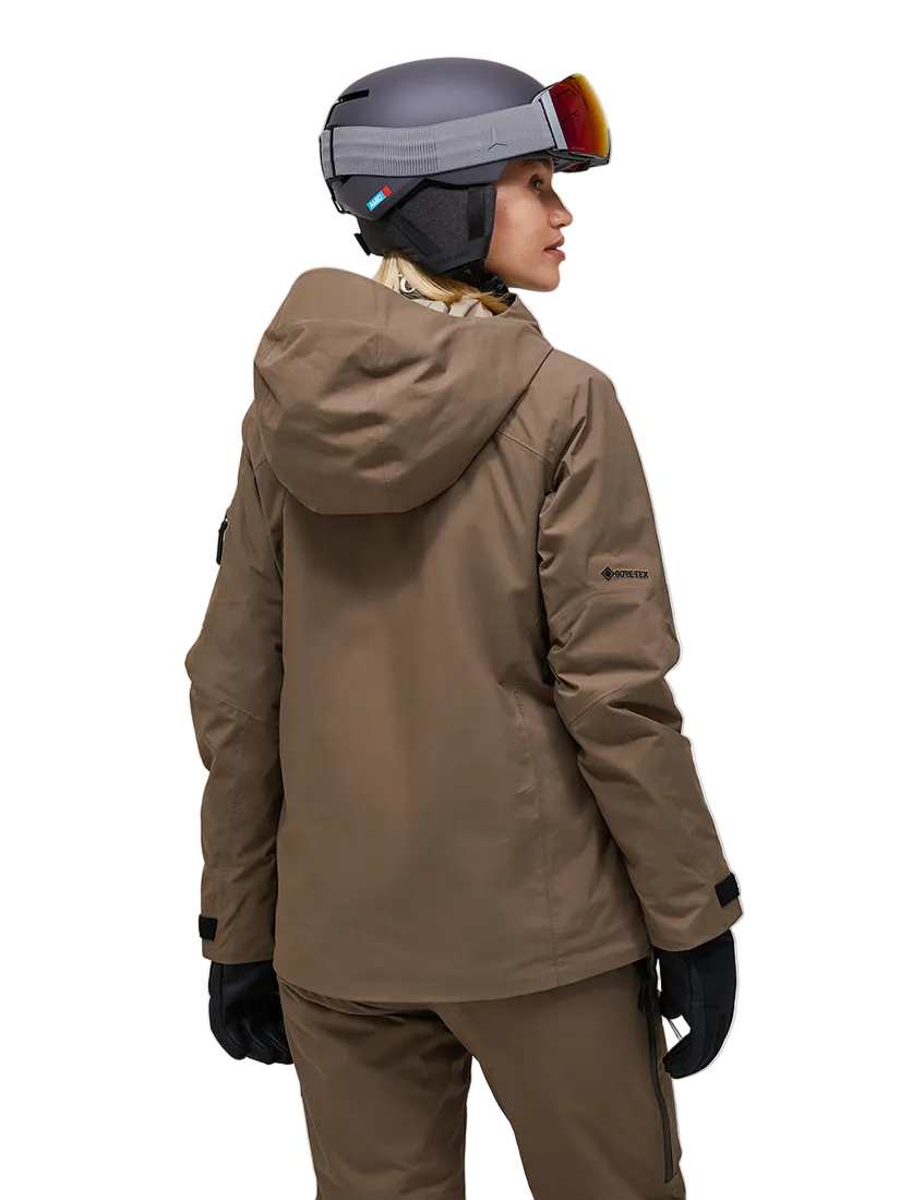 Rear view of a brown Peak Performance Women's Alpine GORE-TEX 2L Insulated Shell Jacket featuring a 2-layer GORE-TEX waterproof shell, YKK AquaGuard storm zippers, an integrated radio pocket, and a helmet-compatible hood.