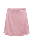Peak Performance Women's Player Golf Skirt featuring lightweight stretch fabric, built-in shorts, and a flattering athletic fit.
