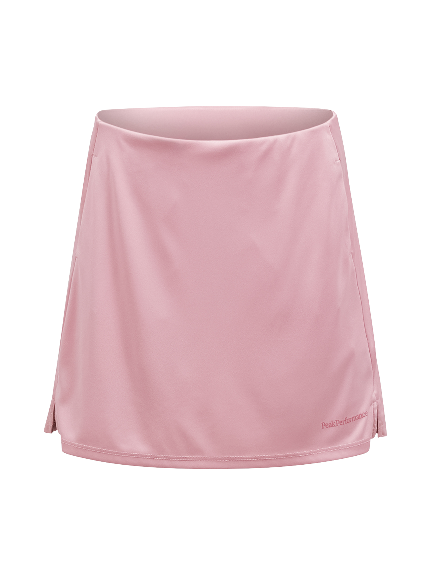 Peak Performance Women's Player Golf Skirt featuring lightweight stretch fabric, built-in shorts, and a flattering athletic fit.