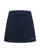Peak Performance Women's Player Golf Skirt featuring lightweight stretch fabric, built-in shorts, and a flattering athletic fit.