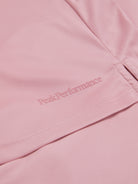 Peak Performance Women's Player Golf Skirt featuring lightweight stretch fabric, built-in shorts, and a flattering athletic fit.