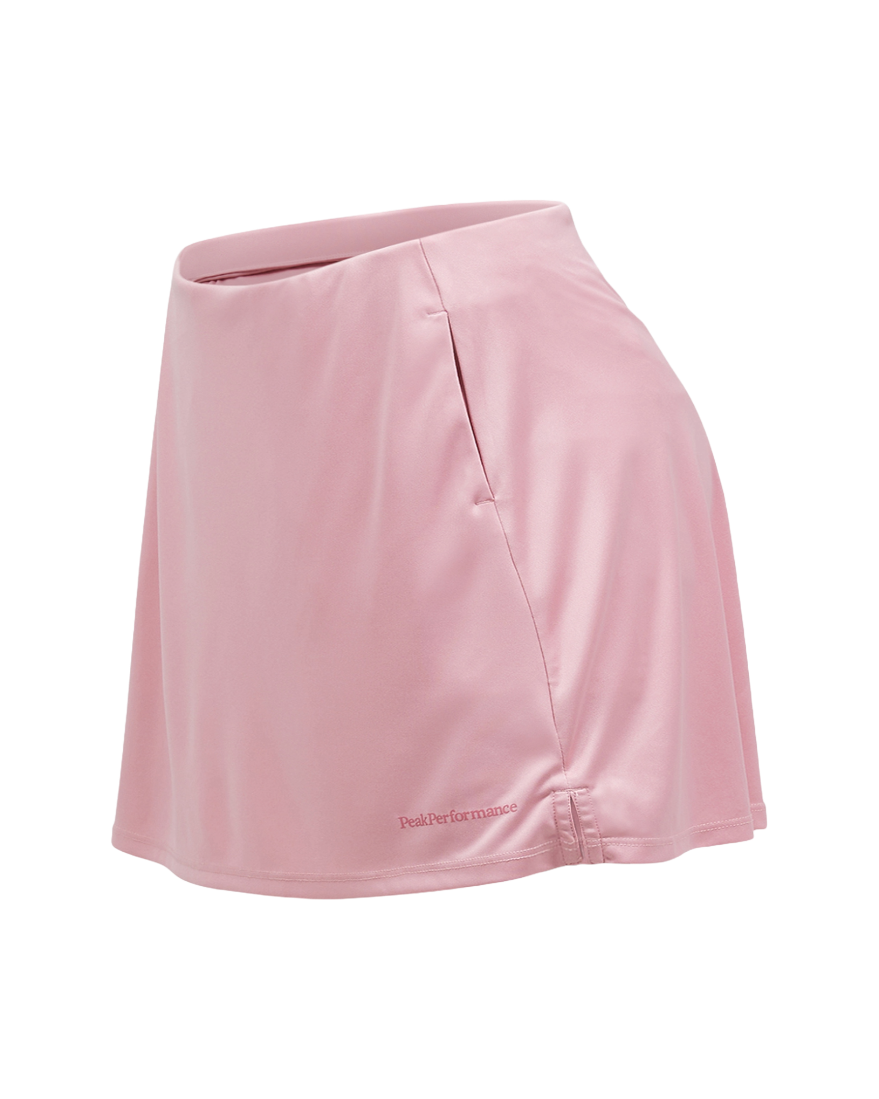 Peak Performance Women's Player Golf Skirt featuring lightweight stretch fabric, built-in shorts, and a flattering athletic fit.