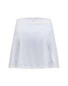 Peak Performance Women's Player Golf Skirt featuring lightweight stretch fabric, built-in shorts, and a flattering athletic fit.