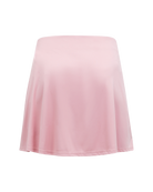 Peak Performance Women's Player Golf Skirt featuring lightweight stretch fabric, built-in shorts, and a flattering athletic fit.