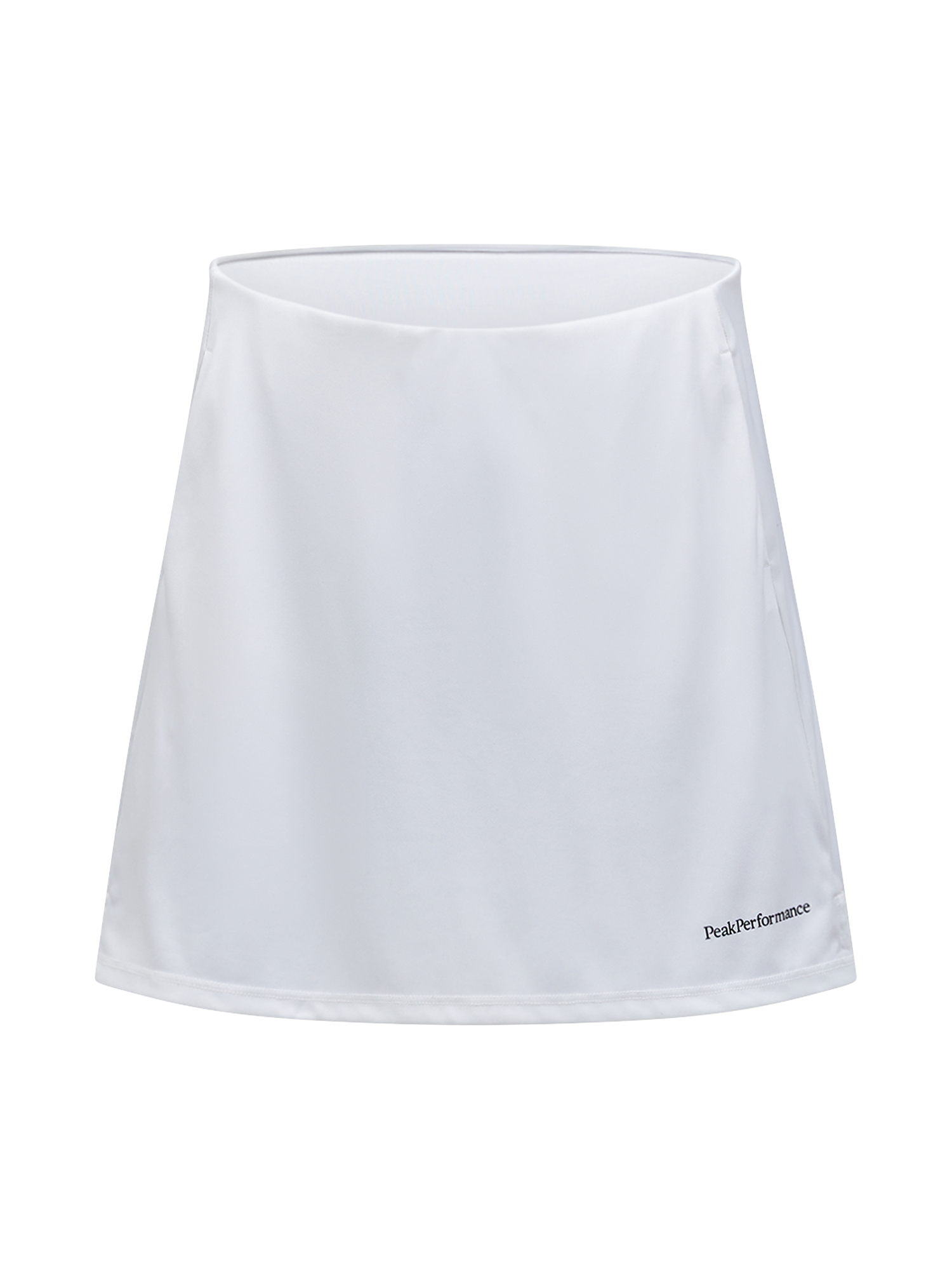 Peak Performance Women's Player Golf Skirt featuring lightweight stretch fabric, built-in shorts, and a flattering athletic fit.
