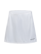 Peak Performance Women's Player Golf Skirt featuring lightweight stretch fabric, built-in shorts, and a flattering athletic fit.