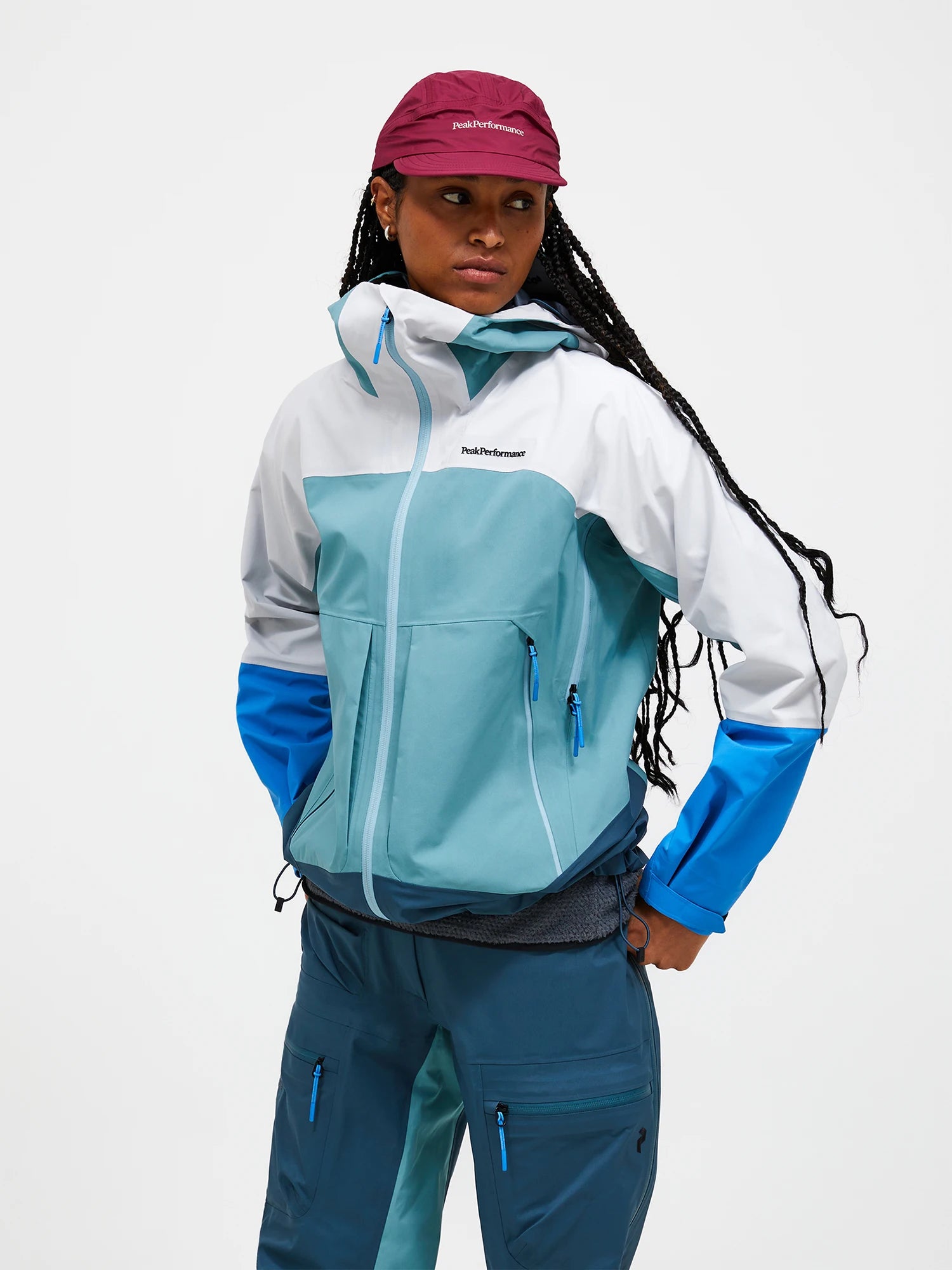 Peak Performance Women's Vislight GORE-TEX C-KNIT™ 3L Ski Jacket featuring waterproof 3-layer construction, helmet-compatible hood, and lightweight alpine performance.