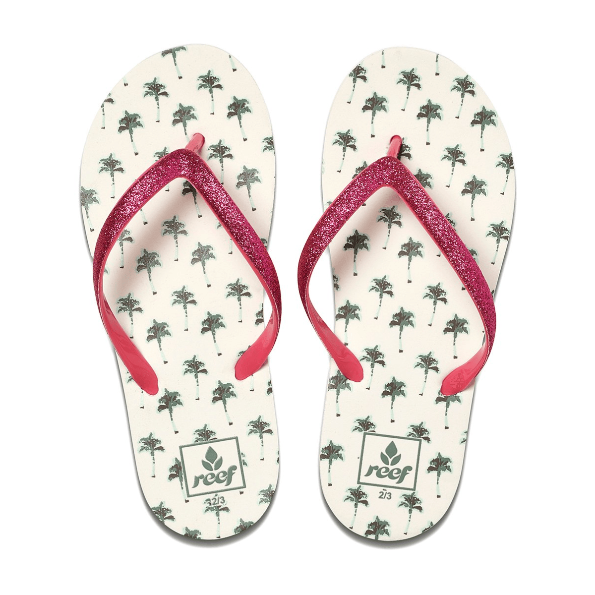 Pair of Reef Junior Stargazer Palm Trees flip-flops with pink straps and palm tree pattern on a white background