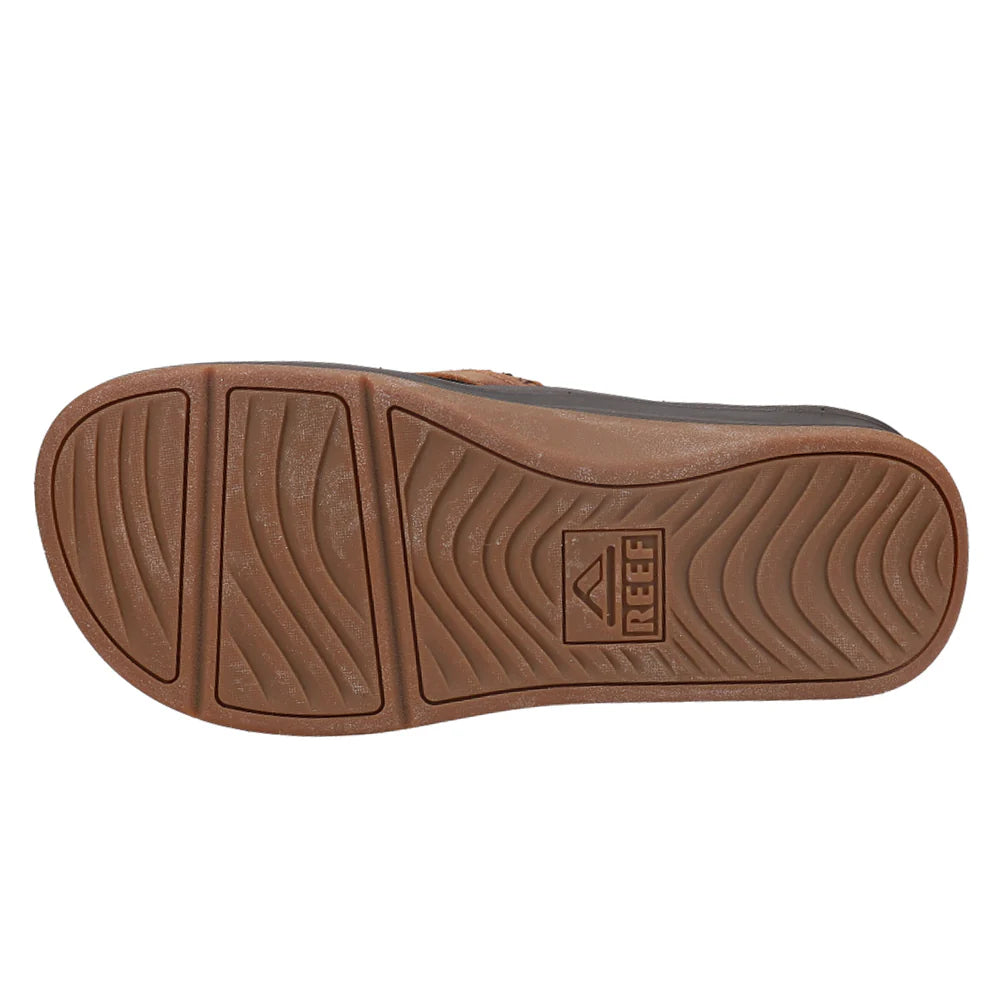 Brown and black Reef Mens Leather Ortho Bounce Coast flip-flop sandal on a white background
