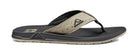 A Black and beige Reef Mens Phantoms sandal on a white background