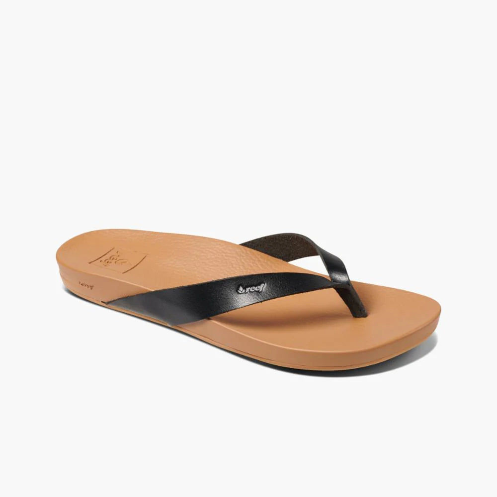 A Womens Reef Cushion Bounce Slim LE flip-flop sandal on a white background