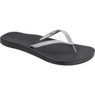 A Reef Women's Cushion Bounce Stargazer flip-flop sandal in black and silver