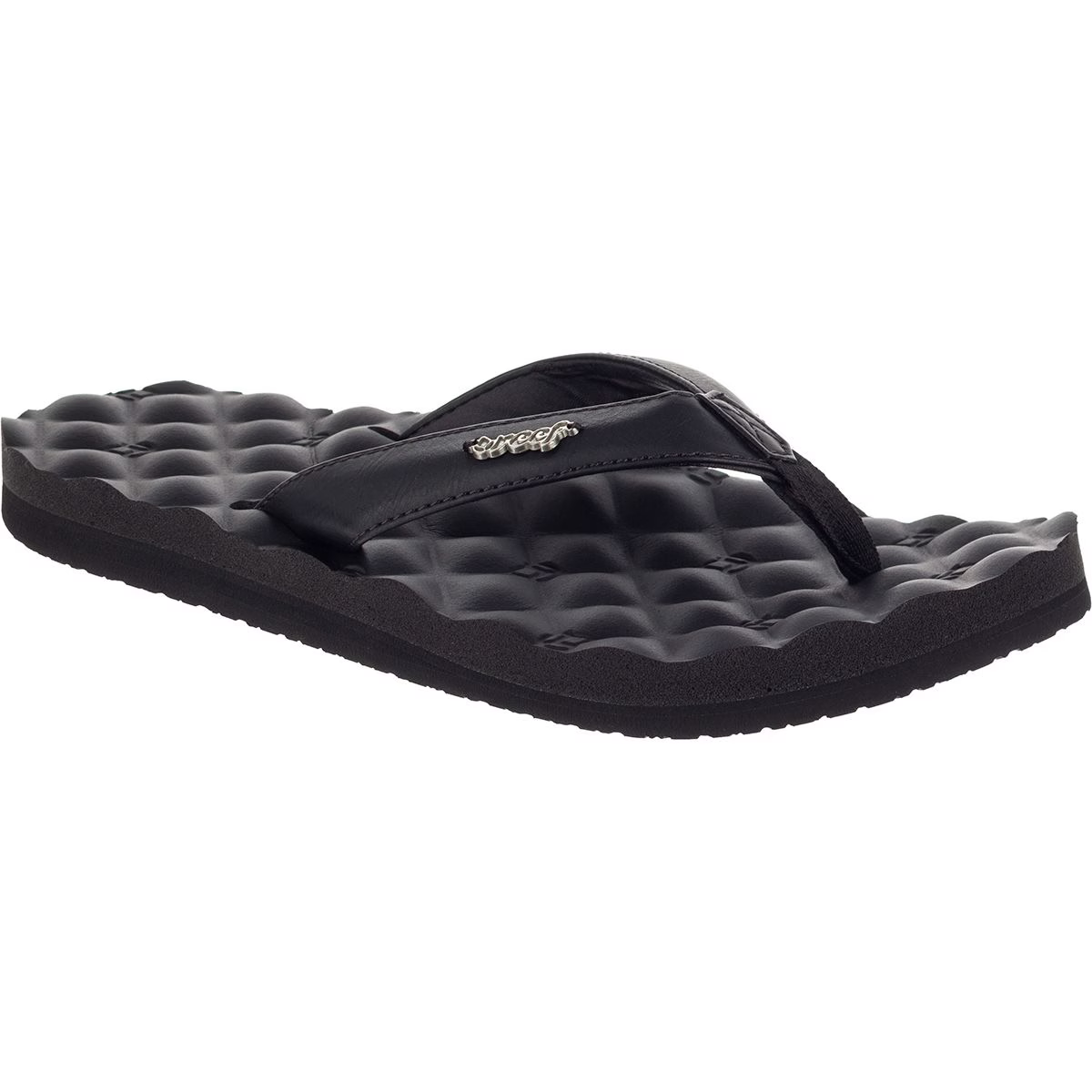 A black Reef Womens Dreams sandal that features a textured footbed on a white background
