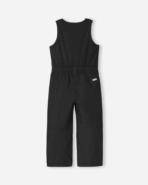 Reima JR Alppi Ski Pants featuring waterproof construction, lightweight insulation, reinforced knees, snow gaiters, and a junior-specific fit for winter adventures.