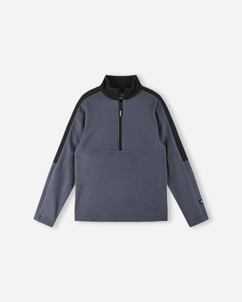 Reima JR Laduille Fleece Sweater featuring lightweight fleece, half-zip collar, breathable fabric, and a junior-specific fit for winter activities.