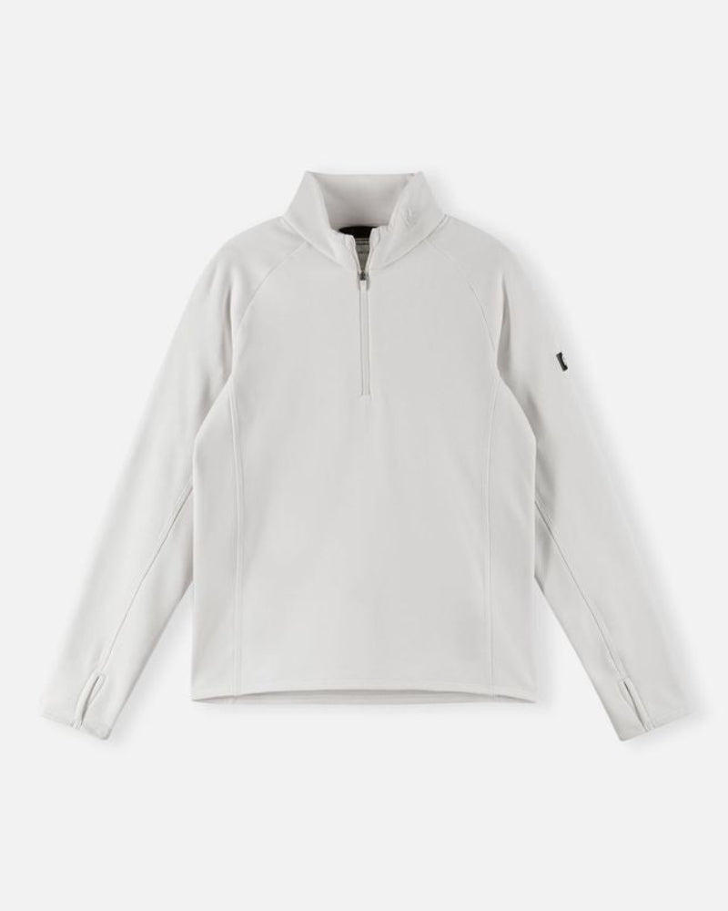 Reima JR Meriol T-Neck featuring stretch performance fabric, brushed interior, quarter-zip collar, and a junior-specific fit for winter activities.