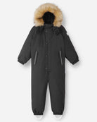 Reima JR Stavanger One-Piece Ski Suit featuring waterproof construction, lightweight insulation, detachable hood, reinforced knees, and full-body winter protection.
