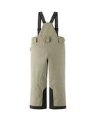 Rear view of beige Reima Jr Wingon Pants featuring a waterproof Reimatec shell, detachable elastic suspenders, reinforced knee and hem panels, and zippered hand pockets.